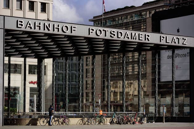 March 21, 2020: A woman looks at the empty Potsdamer Platz. The Governing Mayor of Berlin, Michael Mueller (SPD), prepares restricting residents movements to contain the deadly coronavirus pandemic. Public venues such as bars, clubs, museums, cinemas, schools, daycare centers and universities have already closed. Many businesses are resorting to home office work for their employees. And travel across the border to most neighbouring countries is severely restricted. - ZUMAs172 20200321_zap_s172_010 Copyright: xJanxScheunertx