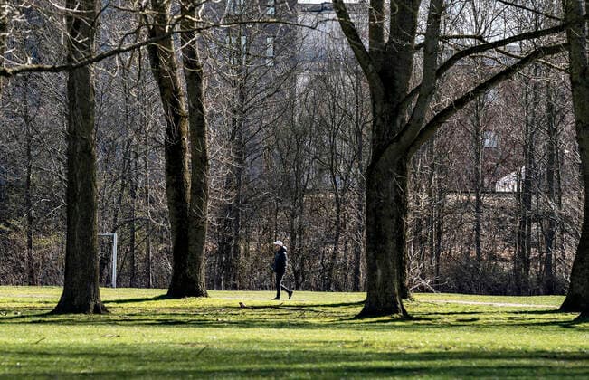 A walk in a park at the waterfront in Aalborg, Saturday March 21, 2020 Throughout the entire port of Aalborg, there was a good distance between the many people who were out and enjoying the weather Because of COVID 19, the people were asked to stay as far as possible indoor and outdoor activities in the beautiful spring weather must take place at a good distance, Aalborg Jylland Denmark,  Copyright: HenningxBagger HenningxBaggerx COP110 spdk20200321-125839-L