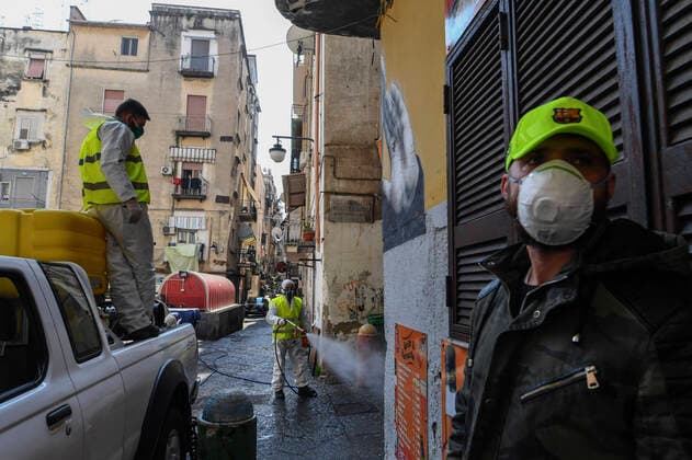Sanitary workers disinfect the streets, of the Spanish quarter, in Naples city to counter the danger of a coronavirus infection (COVID 19).  Copyright: xSalvatorexLaportax xIPAx xKontrolabx