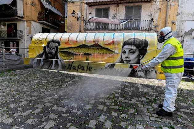 Sanitary workers disinfect the streets, of the Spanish quarter, in Naples city to counter the danger of a coronavirus infection (COVID 19).  Copyright: xSalvatorexLaportax xIPAx xKontrolabx