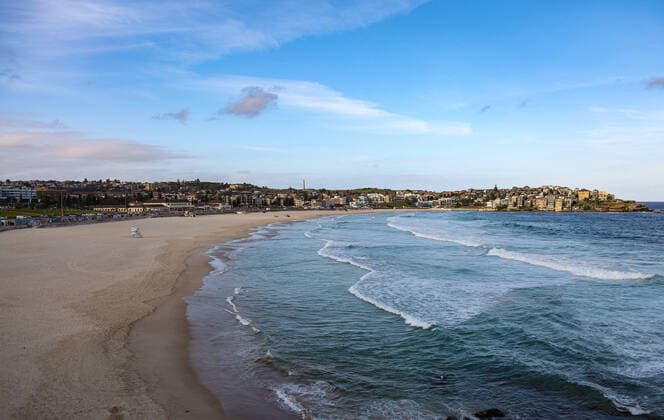 (200321) -- SYDNEY, March 21, 2020 -- Photo taken on March 21, 2020 shows the empty Bondi Beach in Sydney, Australia. Australia s iconic Bondi Beach was closed after hundreds of beachgoers crowded on the sand on Friday ignoring the ongoing social distancing guidelines. Police Minister of the State of New South Wales David Elliott ordered the beach in Sydney to be shut down on Saturday afternoon. There have been 874 confirmed cases of COVID-19 in Australia as of 6:30 a.m. local time Saturday, among which there are 382 in the State of New South Wales. Seven people have died from the disease. ) AUSTRALIA-SYDNEY-COVID-19-BONDI BEACH-CLOSE BaixXuefei 