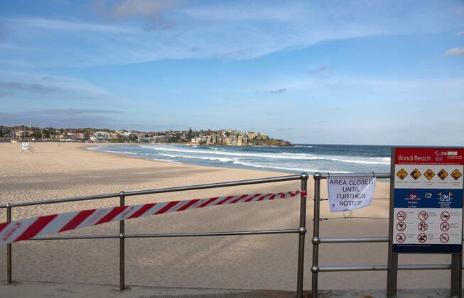 (200321) -- SYDNEY, March 21, 2020 -- Photo taken on March 21, 2020 shows the empty Bondi Beach in Sydney, Australia. Australia s iconic Bondi Beach was closed after hundreds of beachgoers crowded on the sand on Friday ignoring the ongoing social distancing guidelines. Police Minister of the State of New South Wales David Elliott ordered the beach in Sydney to be shut down on Saturday afternoon. There have been 874 confirmed cases of COVID-19 in Australia as of 6:30 a.m. local time Saturday, among which there are 382 in the State of New South Wales. Seven people have died from the disease. ) AUSTRALIA-SYDNEY-COVID-19-BONDI BEACH-CLOSE BaixXuefei 