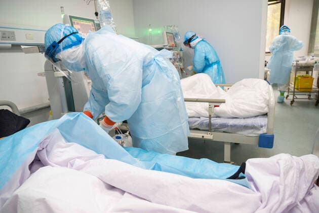 (200321) -- WUHAN, March 21, 2020 -- Medical workers conduct hemodialysis treatment for uremic patients recovering from COVID-19 infection at Hankou Hospital in Wuhan, capital of central China s Hubei Province, March 21, 2020. Medics at the hemodialysis center of the nephrology department of Hankou Hospital have been sticking to their posts during the novel coronavirus epidemic outbreak. In addition to carrying out blood purification treatment for COVID-19 patients in critical conditions, they also conduct hemodialysis treatment for some 40 uremic patients recovering from COVID-19 infection every week. ) CHINA-HUBEI-WUHAN-MEDICS-HEMODIALYSIS (CN) CaixYang 
