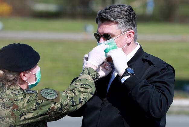 News Bilder des Tages PXL_Zoran Milanovic 21.03.2020., Zagreb, Croatia - Croatian President Zoran Milanovic visited a self-sustaining expeditionary camp hospital set up by the military in the parking lot of the Dubrava Clinical Hospital to combat the coronavirus pandemic. SanjinxStrukic PIXSELL