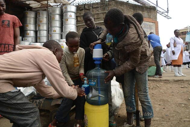 March 20, 2020, Nairobi, Kenya: Street children at Gikomba Market in Nairobi wash their hands with liquid soap as a preventive measure against covid-19..The Kenyan government has banned all public gatherings activities, rallies and crusades. Places of worship are allowed to hold prayers provided they have hand sanitizers. Kenya has so far reported only seven cases of coronavirus. Nairobi Kenya - ZUMAs197 20200320_zaa_s197_269 Copyright: xDennisxSigwex