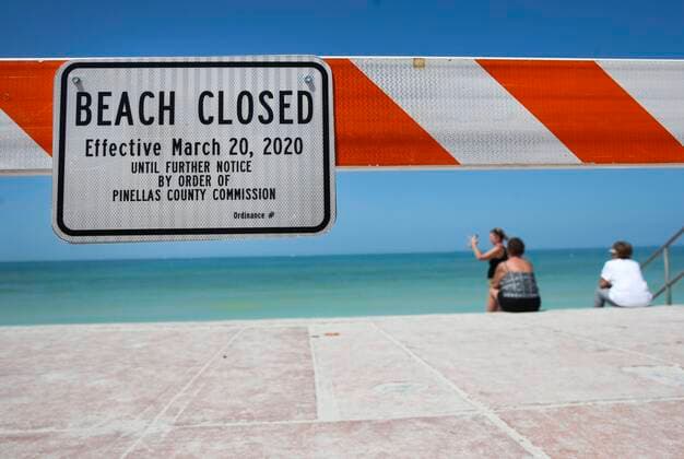 March 21, 2020, Pass-A-Grille, Florida, USA: A look at the mostly empty beach with the beach closed sign and burricade near the steps leading down to the sand on Saturday, March 21, 2020 at Pass-a-Grille. Pinellas County beaches are now closed. Pinellas County announced that all public beaches closed starting onSaturday. Pass-A-Grille USA - ZUMAs70_ 20200321_zan_s70_008 Copyright: xDirkxShaddx