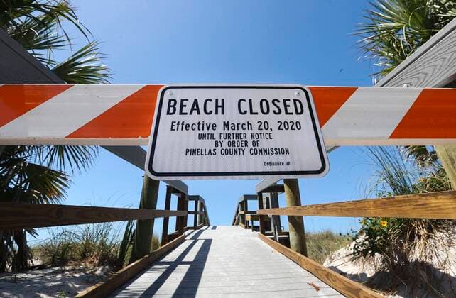 March 21, 2020, Pass-A-Grille, Florida, USA: The beach closed sign and barricade at the beach access walkover at 16th Ave and Gulf Way on Saturday, March 21, 2020 at Pass-a-Grille. Pinellas County beaches are now closed. Pinellas County announced that all public beaches closed starting onSaturday. Pass-A-Grille USA - ZUMAs70_ 20200321_zan_s70_010 Copyright: xDirkxShaddx