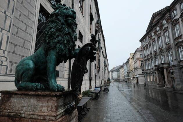 Lion statue in the empty Residenzstrasse Restricted access in Bavaria due to corona pandemic Day 1, Munich on 21 03 2020