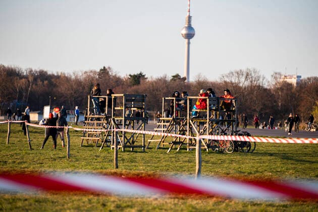People enjoy the sun at Tempelhofer Feld in Berlin on 21 March 2020 The consequences of the corona virus COVID 19 can b