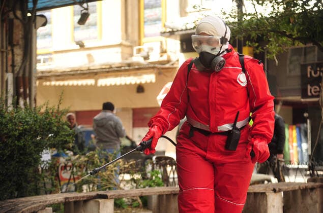 March 21, 2020, Damascus, Damascus, Syrian Arab Republic: Syrian workers disinfect the old market, as a preventive measure amid fears of the spread of the coronavirus, in Damascus, Syria, on March 21, 2020. Even though no cases of coronavirus Covid-19 have yet been reported in the city, some people prefer to take precautionary measures Damascus Syrian Arab Republic - ZUMAap3_ 20200321_zaf_ap3_067 Copyright: xOmarxEstwanix