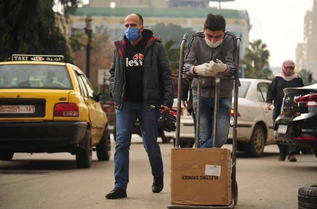 March 21, 2020, Damascus, Damascus, Syrian Arab Republic: Syrian workers disinfect the old market, as a preventive measure amid fears of the spread of the coronavirus, in Damascus, Syria, on March 21, 2020. Even though no cases of coronavirus Covid-19 have yet been reported in the city, some people prefer to take precautionary measures Damascus Syrian Arab Republic - ZUMAap3_ 20200321_zaf_ap3_075 Copyright: xOmarxEstwanix