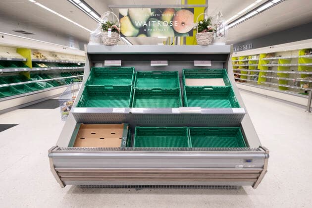 (200321) -- LONDON, March 21, 2020 (Xinhua) -- Photo taken on March 21, 2020 shows empty shelves of a supermarket in London, Britain. As of 9a.m. (0900GMT) on Saturday, 72,818 people have been tested in Britain, of which 67,800 were confirmed negative and 5,018 were confirmed positive. 233 patients in the country who tested positive for the virus have died. (Xinhua) BRITAIN-LONDON-COVID-19 