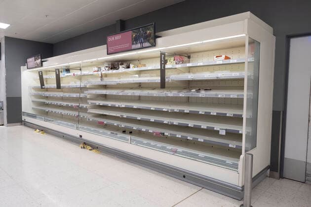 (200321) -- LONDON, March 21, 2020 (Xinhua) -- Photo taken on March 21, 2020 shows almost-empty shelves of a supermarket in London, Britain. As of 9a.m. (0900GMT) on Saturday, 72,818 people have been tested in Britain, of which 67,800 were confirmed negative and 5,018 were confirmed positive. 233 patients in the country who tested positive for the virus have died. (Xinhua) BRITAIN-LONDON-COVID-19 