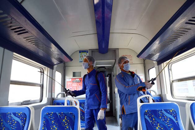(200321) -- CAIRO, March 21, 2020 (Xinhua) -- Workers spray disinfectant in a train at Ramses railway station in Cairo, Egypt, on March 21, 2020. Egypt announced on Saturday two more deaths from COVID-19 and nine new cases of infection, bringing the total number of confirmed cases to 294 in the country. (Photo by Ahmed Gomaa Xinhua) EGYPT-CAIRO-COVID-19-MEASURES 