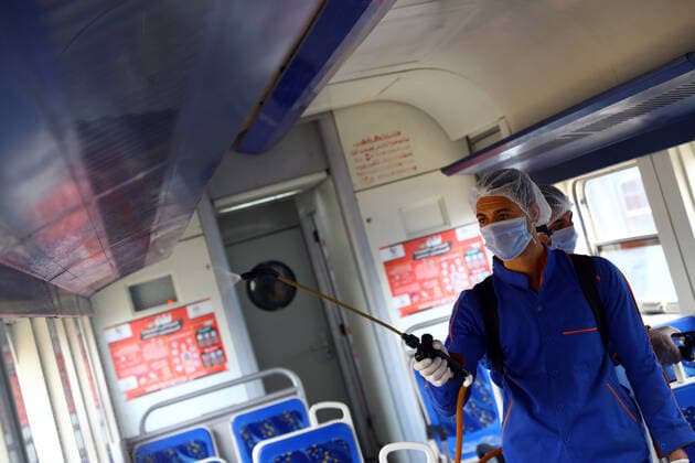 (200321) -- CAIRO, March 21, 2020 (Xinhua) -- Workers spray disinfectant in a train at Ramses railway station in Cairo, Egypt, on March 21, 2020. Egypt announced on Saturday two more deaths from COVID-19 and nine new cases of infection, bringing the total number of confirmed cases to 294 in the country. (Photo by Ahmed Gomaa Xinhua) EGYPT-CAIRO-COVID-19-MEASURES 