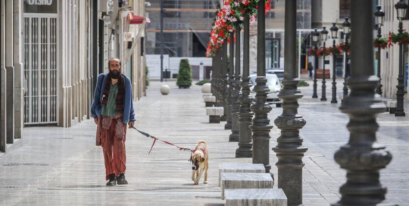 March 21, 2020: March 21, 2020 (Malaga) Take out the dog ,make the purchase are the only esxcusas to be on the street in the state of alarm of Spain. Despite this, there are still queues at the doors of the supermarkets in Malaga, where the star product is toilet paper and basic necessities. These are consequences of the Coronavirus. - ZUMAc161 20200321_zap_c161_073 Copyright: xLorenzoxCarnerox
