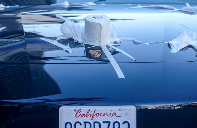 March 21, 2020, Los Angeles, California, U.S: A Porsche is decorated with toilet papers is seen on Hollywood Boulevard on Saturday, March 21, 2020, in Los Angeles. California Gov. Gavin Newsom issued a statewide stay-at-home order Thursday for residents to venture outside only for essential jobs, errands and some exercise, due to coronavirus concerns. Los Angeles U.S. - ZUMAc68_ 20200321_zaf_c68_016 Copyright: xRingoxChiux