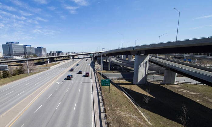 (200322) -- ONTARIO, March 22, 2020 -- Expressways are seen with less traffic near the Pearson International Airport in Toronto, Canada, March 21, 2020. At midnight on Friday the land border between Canada and the United States was closed to all non-essential travel in an effort to stem the spread of COVID-19. (Photo by Xinhua) CANADA-ONTARIO-COVID-19-U.S.-BORDER-CLOSURE ZouxZheng 