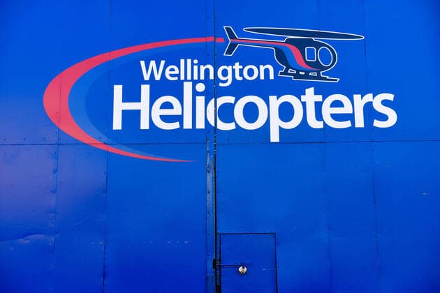 (200322) -- WELLINGTON, March 22, 2020 -- A helicopter warehouse of a tourism project is seen closed in Wellington, New Zealand, March 22, 2020. New Zealand reported 14 new cases of COVID-19 on Sunday, bringing the total number of confirmed cases to 66. The country is at COVID-19 alert level two. ) NEW ZEALAND-WELLINGTON-ALERT SYSTEM-LEVEL TWO GuoxLei 