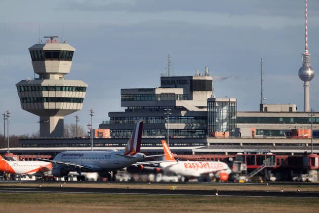 21 03 2020, Berlin, GER Aircraft of easyjet and germanwings at the terminal of Berlin Tegel Airport In the background you can see the Berlin TV tower parked, everyday life, outside, outdoor shot, Berlin, German, Germany, easyjet, Europe, European, Television Tower, Airport, Airport Tegel, Aircraft, Sprin