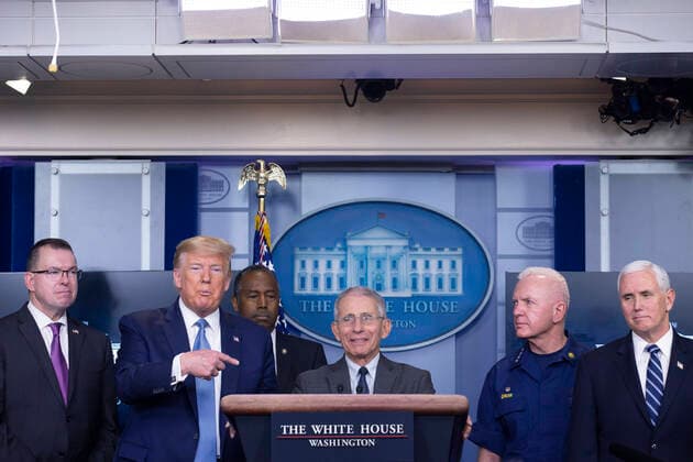 United States President Donald J. Trump points to Director of the National Institute of Allergy and Infectious Diseases at the National Institutes of Health Dr. Anthony Fauci as he makes remarks on the Coronavirus crisis in the Brady Press Briefing Room of the White House in Washington, DC on Saturday, March 21, 2020. Copyright: xStefanixReynoldsx