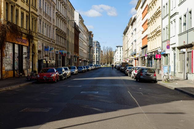 The Oranienstraße in Berlin Kreuzberg at the time of Covid 19 Hardly any people or traffic on the otherwise busy Oranienstraße in Berlin Kreuzberg Due to the current Covid 19 situation, most shops had to close temporarily to slow down the spread of the corona virus , Berlin Berlin Germany Kreuzberg