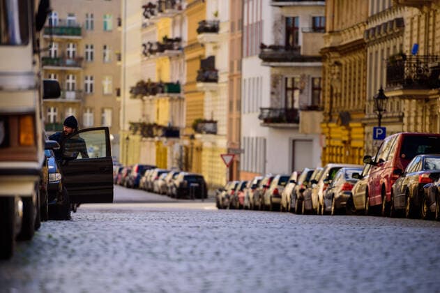 March 22, 2020: A man enters a car in an empty street in Berlin Kreuzberg while the Berlin Senate has decided on further precautions to contain the coronavirus pandemic. Therefore, no more events, meetings and gatherings of more than ten people are allowed. Physical contact with other people is to be reduced to an absolutely necessary minimum in the future. Wherever possible, a minimum distance between two persons of 1.5 metres should be maintained. - ZUMAs172 20200322_zap_s172_008 Copyright: xJanxScheunertx