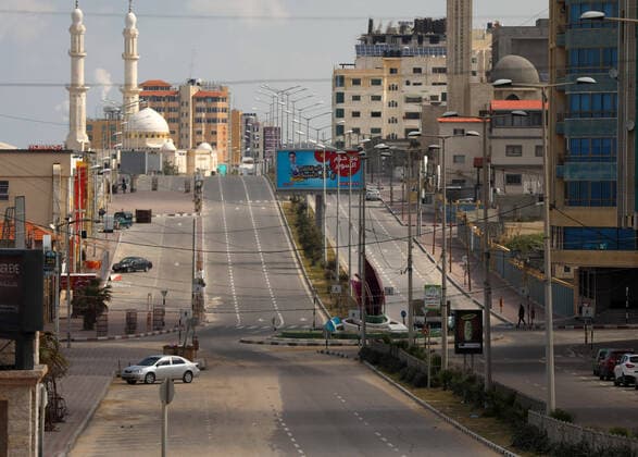 March 22, 2020, Gaza City, Gaza Strip, Palestinian Territory: A street is seen almost empty as a preventive measure against the coronavirus, in Gaza City, on March 22, 2020. Authorities in Gaza confirmed the first two cases of novel coronavirus, identifying them as Palestinians who had travelled to Pakistan and were being held in quarantine since their return. The United Nations has warned that a COVID-19 outbreak in Gaza could be disastrous, given the high poverty rates and weak health system in the coastal strip under Israeli blockade since 2007 Gaza City Palestinian Territory - ZUMAap3_ 20200322_zaf_ap3_158 Copyright: xYasserxQudihx