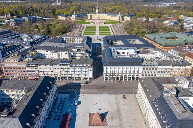 Aerial view city center on 22 03 2020 in Karlsruhe , Germany In front the pyramid of Karlsruhe at the market place, in the back the landmark of Karlsruhe, the castle and the Landesmuseum Karlsruhe city center east southwest Te Baden Württemberg Germany