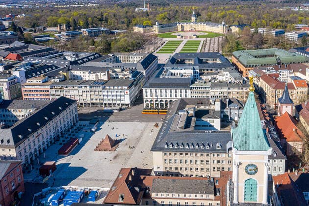 Aerial view city center on 22 03 2020 in Karlsruhe , Germany Tower of the protestant city church, in the background the landmark of Karlsruhe, the castle Karlsruhe city center east southwest Te Baden Württemberg Germany
