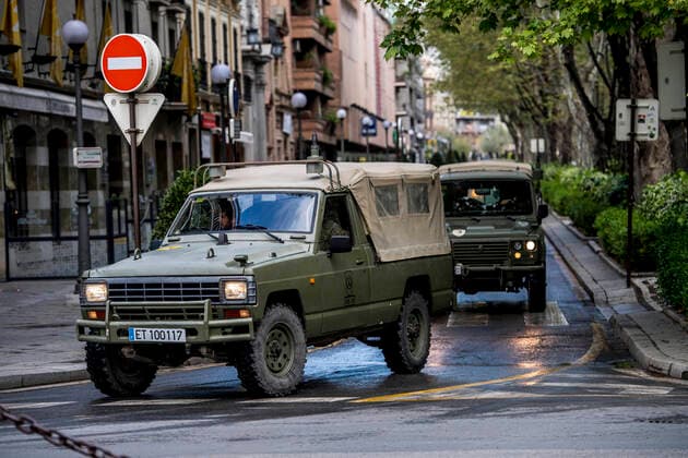 March 22, 2020, Granada, Spain: Army cars arriving for the disinfection work during the state of emergency..The Spanish government has decreed 15 more days of a state of emergency due to the situation of the coronavirus outbreak. In Spain the current situation is 28,000 infected and 1,720 dead by the COVID-19. Granada Spain - ZUMAs197 20200322_zaa_s197_139 Copyright: xCarlosxGilx