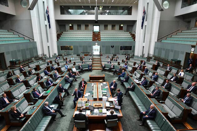 CORONAVIRUS LEGISLATION PARLIAMENT, Members of the Federal Parliament attend a sitting under rules of social distancing in the House of Representatives at Parliament House in Canberra, Monday, March 23, 2020. ( NO ARCHIVING, EDITORIAL USE ONLY, NO USE IN BOOKS WITHOUT CONSENT CANBERRA ACT AUSTRALIA  Copyright: xLUKASxCOCHx 20200323001458838965