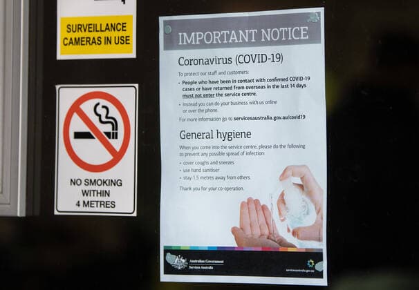 CENTRELINK QUEUES SYDNEY, A sign highlighting entry conditions is seen at a Centrelink service centre in Sydney, Monday, March 23, 2020. The federal government has announced two separate economic stimulus packages, including increased access to Centrelink payments designed to help support the Australian economy through the COVID-19 pandemic. ( NO ARCHIVING, EDITORIAL USE ONLY, NO USE IN BOOKS WITHOUT CONSENT SYDNEY NSW AUSTRALIA  Copyright: xJAMESxGOURLEYx 20200323001458839761