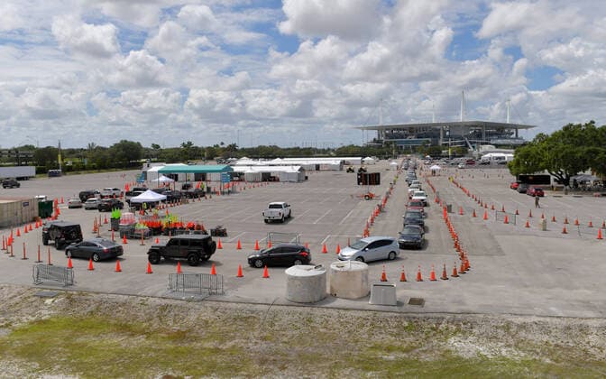 MIAMI GARDENS, FL - MARCH 22: FIRST RESPONDERS ONLY TESTING DAY - Instead of setting up for the Miami Open tennis tournament, the Florida National Guard (many without face masks due to shortage) was running a drive-through testing site off the Florida Turnpike at the Hard Rock Stadium in Miami Gardens where people can go for a COVID-19 Test Without Getting out of their Cars. As Miami-Dade Countys number of COVID-19 cases rise to 169, the site will open at 9 a.m. Monday in the east parking lot of the Hard Rock Stadium, 347 Don Shula Drive. The testing is free and the site will be open from 9 a.m. to 5 p.m. on a daily basis, said Juan Diasgranados, a spokesperson for the testing site. The test site will be run and was created by several local, state and national agencies which include FEMA, the CDC, Florida Department of Health, Florida A - ZUMAs214 20200323_zba_s214_019 Copyright: xSMGx