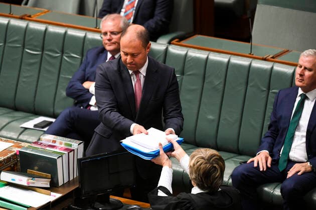 CORONAVIRUS LEGISLATION PARLIAMENT, Australian Treasurer Josh Frydenberg tables the Coronavirus Economic Response Package Omnibus Bill 2020 during parliamentary sitting under rules of social distancing in the House of Representatives at Parliament House in Canberra, Monday, March 23, 2020. ( NO ARCHIVING, EDITORIAL USE ONLY, NO USE IN BOOKS WITHOUT CONSENT CANBERRA ACT AUSTRALIA  Copyright: xLUKASxCOCHx 20200323001458843607