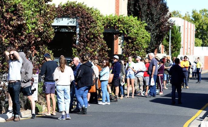 CENTRELINK QUEUES ADELAIDE, People are seen queuing outside the Centrelink office at Norwood in Adelaide, Monday, March 23, 2020. The federal government has announced two separate economic stimulus packages, including increased access to Centrelink payments designed to help support the Australian economy through the COVID-19 pandemic. ( NO ARCHIVING, EDITORIAL USE ONLY, NO USE IN BOOKS WITHOUT CONSENT ADELAIDE SA AUSTRALIA  Copyright: xKELLYxBARNESx 20200323001458849813