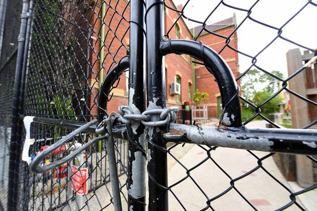 COVID19 VIC SCHOOL CLOSURES, Locked gates are seen at a Primary School in Melbourne s inner north, Monday, March 23, 2020. Victorian Premier Daniel Andrews has brought forward school holidays as a measure to slow the rapid spreading Covid-19 virus through the state. ( NO ARCHIVING, EDITORIAL USE ONLY, NO USE IN BOOKS WITHOUT CONSENT MELBOURNE VIC AUSTRALIA  Copyright: xJAMESxROSSx 20200323001458879104
