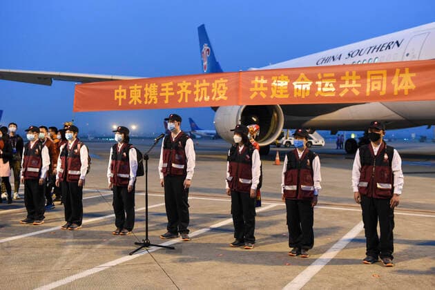 (200323) -- NANNING, March 23, 2020 -- Members of the Chinese medical team line up before leaving for Cambodia in Nanning, south China s Guangxi Zhuang Autonomous Region, March 23, 2020. The Chinese government has sent a team of medical experts to Cambodia to help the country fight the COVID-19 pandemic, Foreign Ministry spokesperson Geng Shuang announced Monday. ) CHINA-GUANGXI-NANNING-COVID-19-CAMBODIA-EXPERTS-DEPARTURE (CN) CaoxYiming 