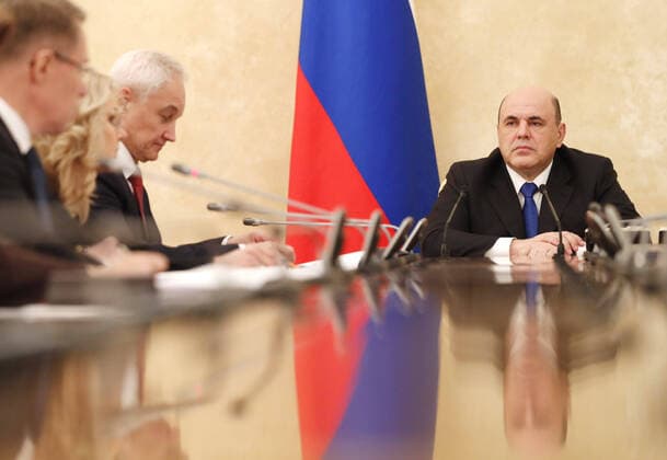 MOSCOW, RUSSIA - MARCH 23, 2020: Russia s Prime Minister Mikhail Mishustin (R) during a meeting on the COVID-19 coronavirus situation at the House of the Russian Government. Pictured: Russia s Healthcare Minister Mikhail Murashko, Russia s Deputy Prime Minister Tatyana Golikova and Russia s First Deputy Prime Minister Andrei Belousov (L-R). Dmitry Astakhov POOL TASS  TS0D3161
