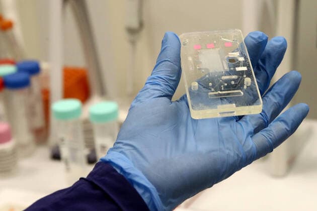 MOSCOW, RUSSIA - MARCH 23, 2020: A chip from a polymerase chain reaction (PCR) kit for COVID-19 coronavirus testing at the Federal Research and Clinical Center of Physical-Chemical Medicine of the Federal Medical and Biological Agency (FMBA). Sergei Fadeichev TASS  TS0D3229
