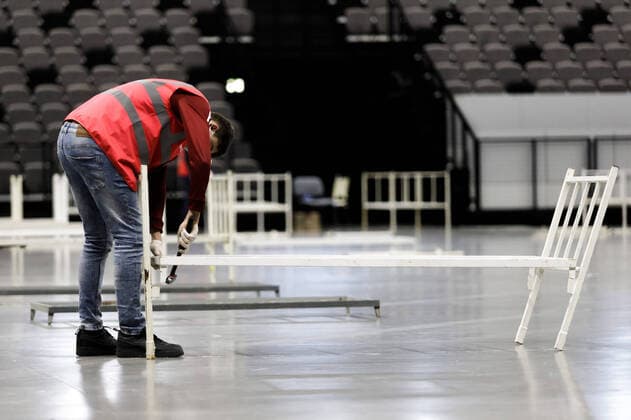 Split: Volunteers of the Red Cross began setting up beds in Spaladium Arena 23.03.2020., Croatia, Split - Red Cross volunteers begin setting up beds in the Spaladium arena, which will serve as a reception center for coronavirus patients in the Split-Dalmatia County. MilanxSabic PIXSELL