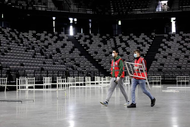 Split: Volunteers of the Red Cross began setting up beds in Spaladium Arena 23.03.2020., Croatia, Split - Red Cross volunteers begin setting up beds in the Spaladium arena, which will serve as a reception center for coronavirus patients in the Split-Dalmatia County. MilanxSabic PIXSELL
