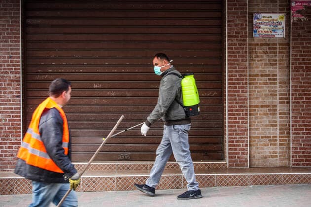 Coronavirus precautions in Gaza A member of a volunteer group carries out disinfection works as a precaution against the coronavirus (COVID-19) pandemic at a shopping area in Beit Lahia, north of Gaza, Gaza. Gaza Palestine Copyright: RamezxHabboub