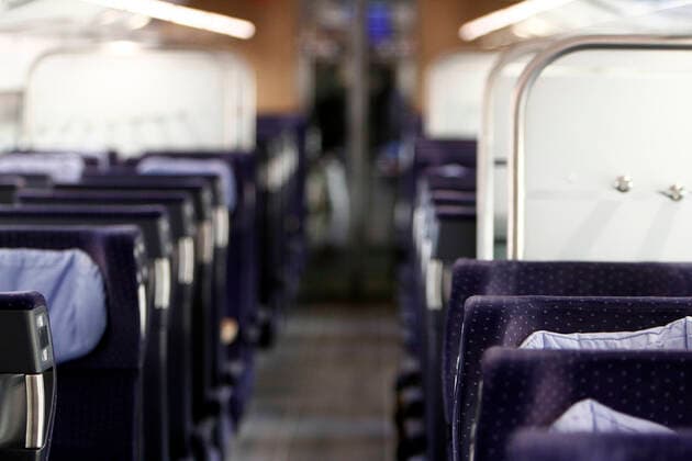 The conoravirus crisis and extended initial restrictions by the authorities are increasingly leading to a decline in public life and restriction of individual mobility of almost deserted 2 class passenger cars of an ICE s of DB Deutsche n Bahn in Mannheim, Baden Württemberg, Germany