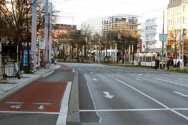 Due to the official order to close all shops and to stop public life as far as possible, car traffic in the city centre of Mannheim, as here at the Kaiserring, has also come to a complete standstill, Baden Württemberg, Germany