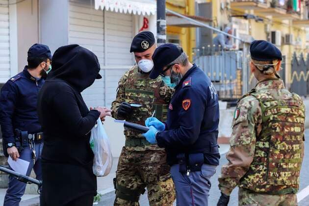 Italian Army soldiers and police jointly patrol the streets in a Naples neighborhood after the Italian government decided to deploy troops to check the compliance with the general lockdown and the pandemic of the coronavirus which causes the Covid-19 disease is not showing any sign of slowing down in the country.  Copyright: xSalvatorexLaportax xIPAx xKontrolabx