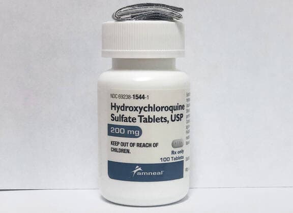 A bottle of hydroxychloroquine 200 mg tablets sits on a pharmacy store shelf in Salem, New York on Monday, March 23, 2020. Hope has emerged for COVID-19 and Coronavirus around two anti-malaria drugs: chloroquine, discovered in 1934, and a derivative of it called hydroxychloroquine that is thought to have less severe side effects. The CDC is operating tests on these and other drugs to combat the Coronavirus pandemic.  NYP20200323902 str