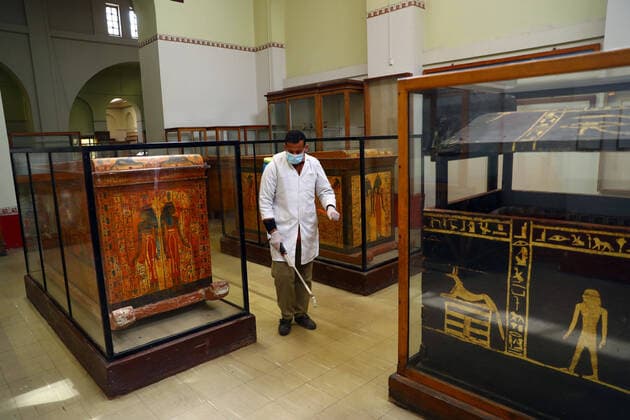 (200323) -- CAIRO, March 23, 2020 -- A man sprays disinfectant at the Egyptian Museum in downtown Cairo, Egypt, March 23, 2020. Egypt confirmed on Sunday 33 new COVID-19 cases, raising the total cases in the country to 327, the Egyptian Health Ministry said in a statement. The Egyptian Ministry of Tourism and Antiquities announced on Saturday the shutting down of all museums and archeological sites and attractions nationwide from March 23 to 31 for sterilization. (Photo by Ahmed Gomaa Xinhua) EGYPT-CAIRO-EGYPTIAN MUSEUM-COVID-19-MEASURES WuxHuiwo 