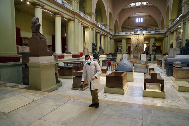 (200323) -- CAIRO, March 23, 2020 -- A man sprays disinfectant at the Egyptian Museum in downtown Cairo, Egypt, March 23, 2020. Egypt confirmed on Sunday 33 new COVID-19 cases, raising the total cases in the country to 327, the Egyptian Health Ministry said in a statement. The Egyptian Ministry of Tourism and Antiquities announced on Saturday the shutting down of all museums and archeological sites and attractions nationwide from March 23 to 31 for sterilization. (Photo by Ahmed Gomaa Xinhua) EGYPT-CAIRO-EGYPTIAN MUSEUM-COVID-19-MEASURES WuxHuiwo 
