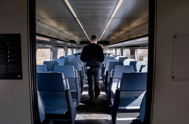 Train driver Soar Juhl Varnaes passes through his largely empty IC train after stopping at Hoeje Taastrup Station, Monday, March 23, 2020 Far fewer passengers travel by trains due to the coronavirus pandemic, therefore DSB will start driving on Monday after a reduced timetable, Copenhagen Denmark,  Copyright: Ritzau Scanpix LiselottexSabroex COP111 spdk20200323-162733-L